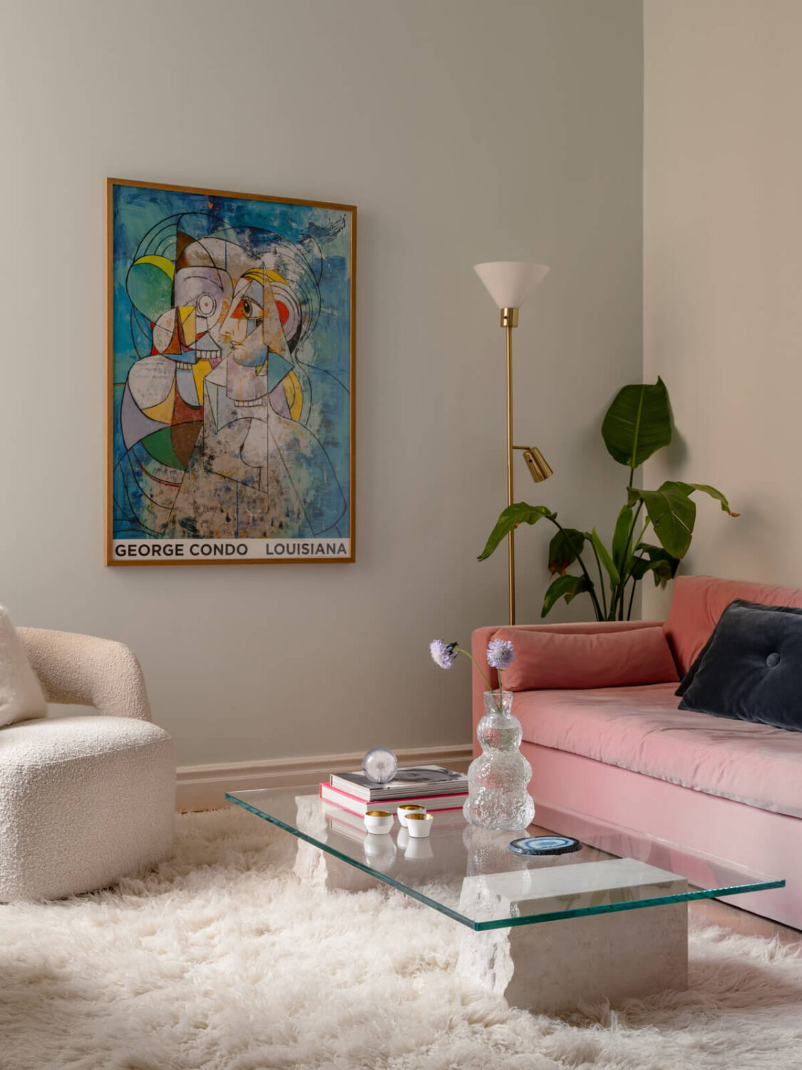 A Small Pink and Blue Apartment with High Ceilings in Stockholm 5 sitting-room-pink-sofa-fluffy-white-rug