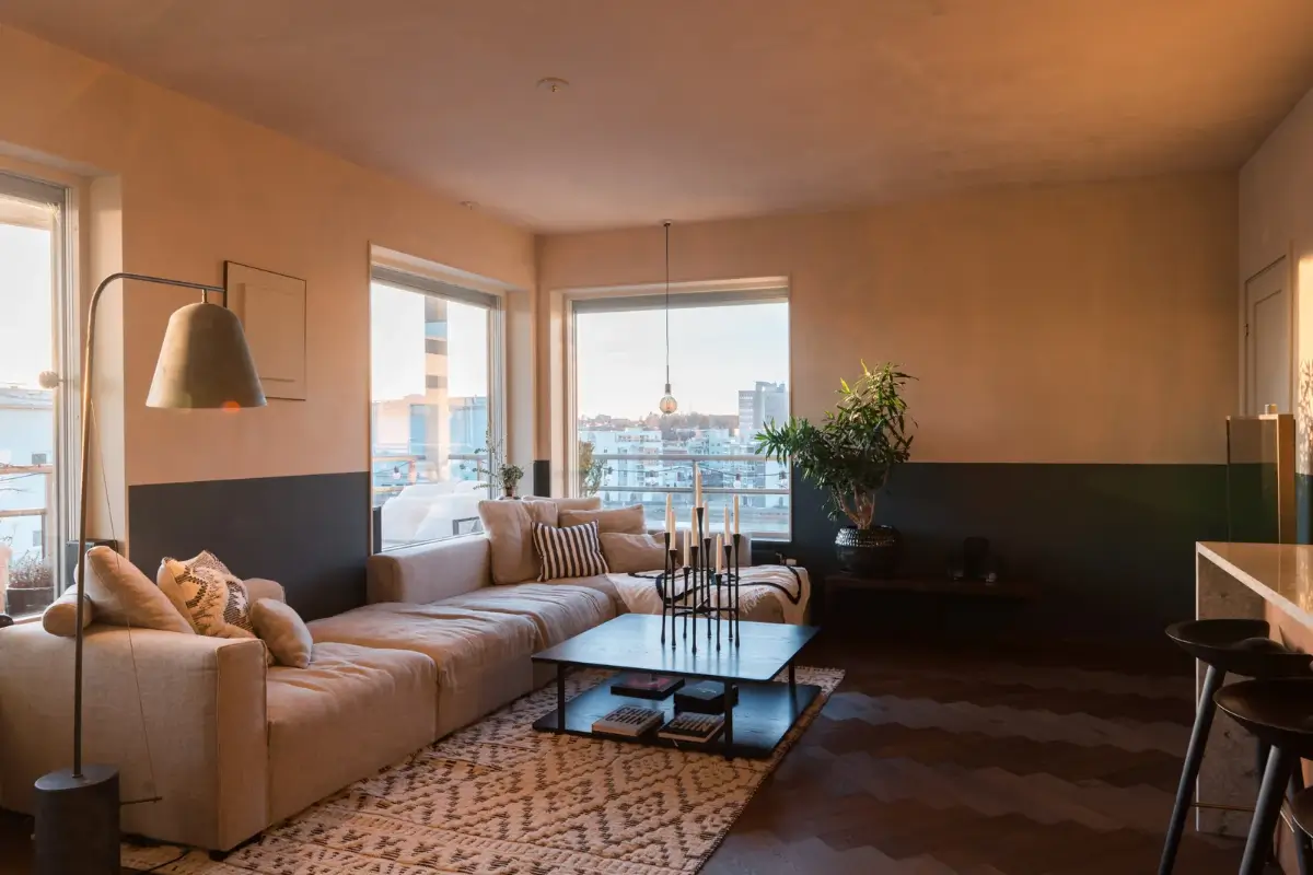 A Top Floor Swedish Apartment with a Huge Balcony 2 sitting room with plaster walls