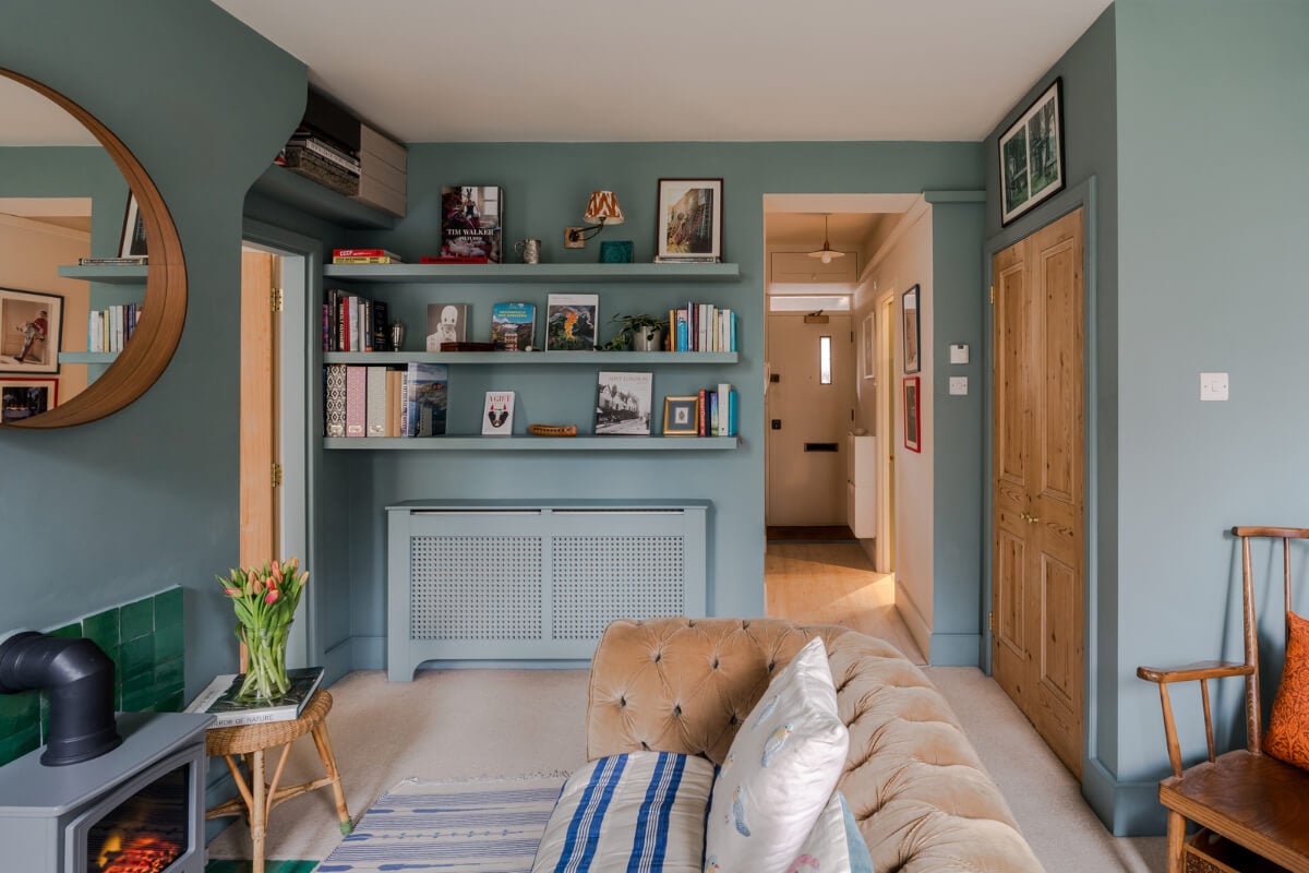 A Calm & Stylish Color Palette in a Small London Apartment 7 small blue living room shelves round mirror