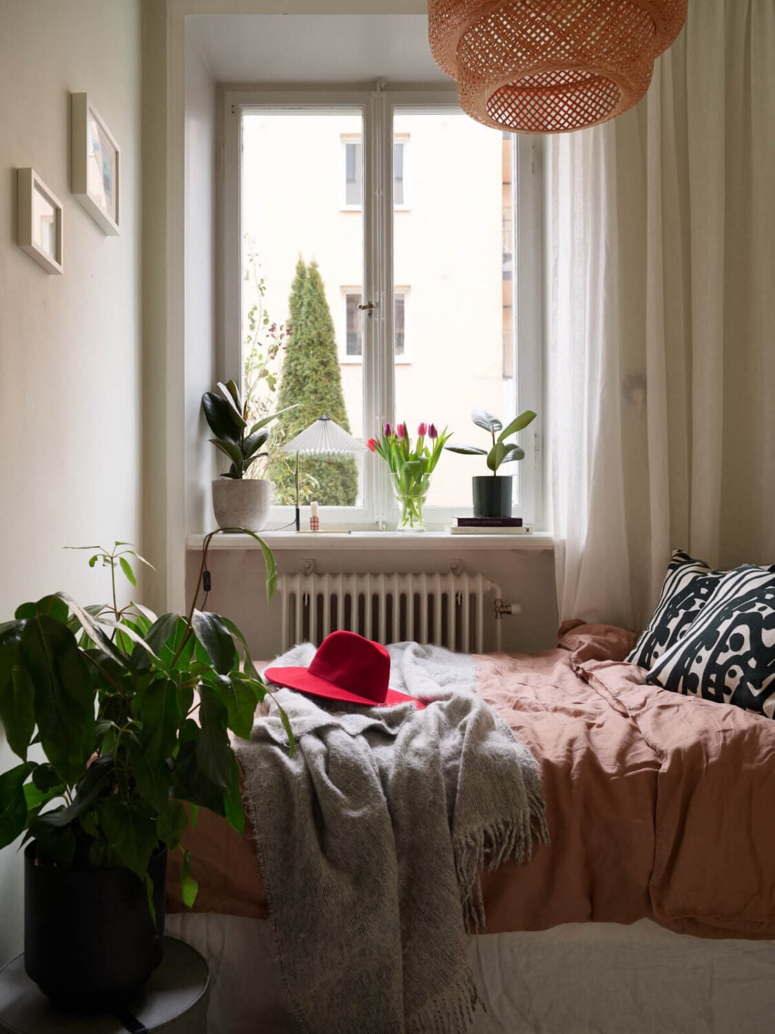 A Charming Small Apartment with a Fresh White Kitchen 15 small cozy bedroom
