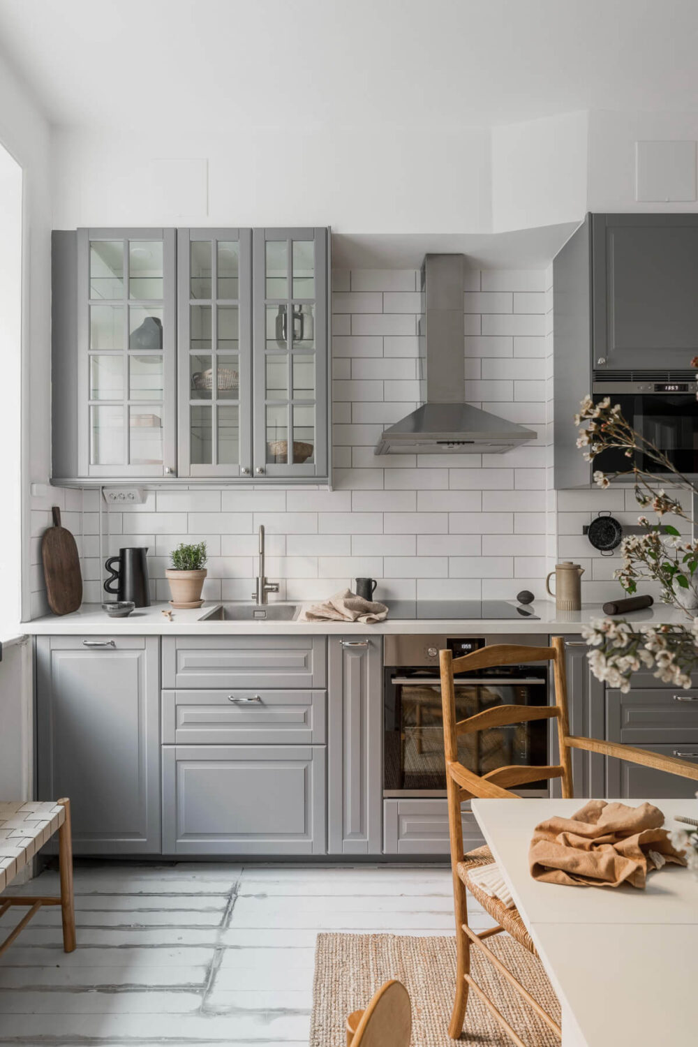 A Light Swedish Studio in an Early 20th Century Building 16 small gray kitchen white tiles
