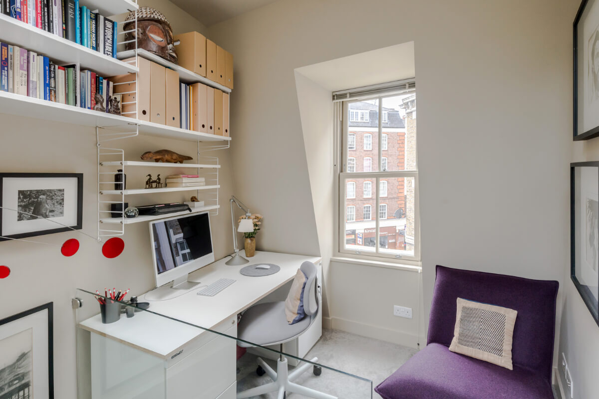 A Narrow Five-Story House with a Roof Garden in London's Clerkenwell 16 small home office slanted ceiling