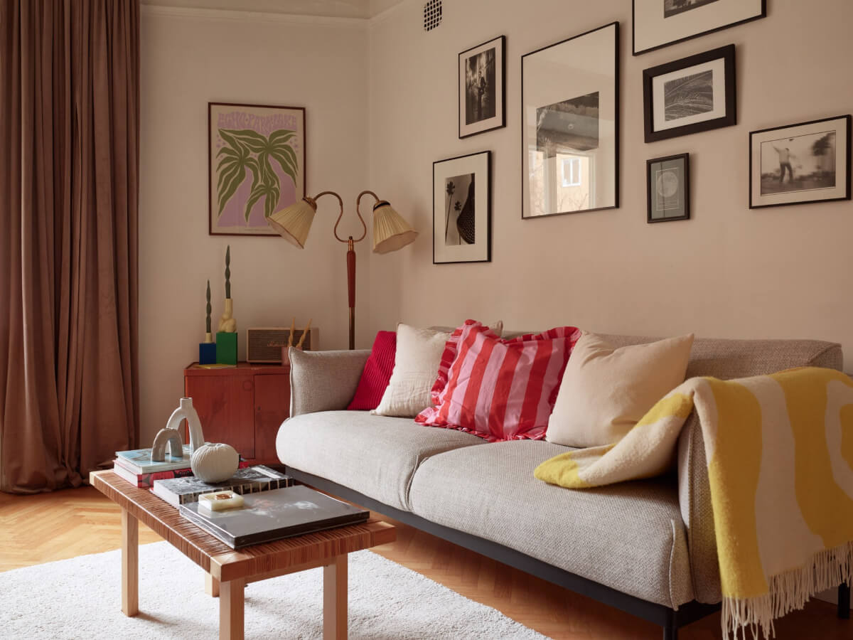 A Charming Small Apartment with a Fresh White Kitchen 4 small living room colorful textiles