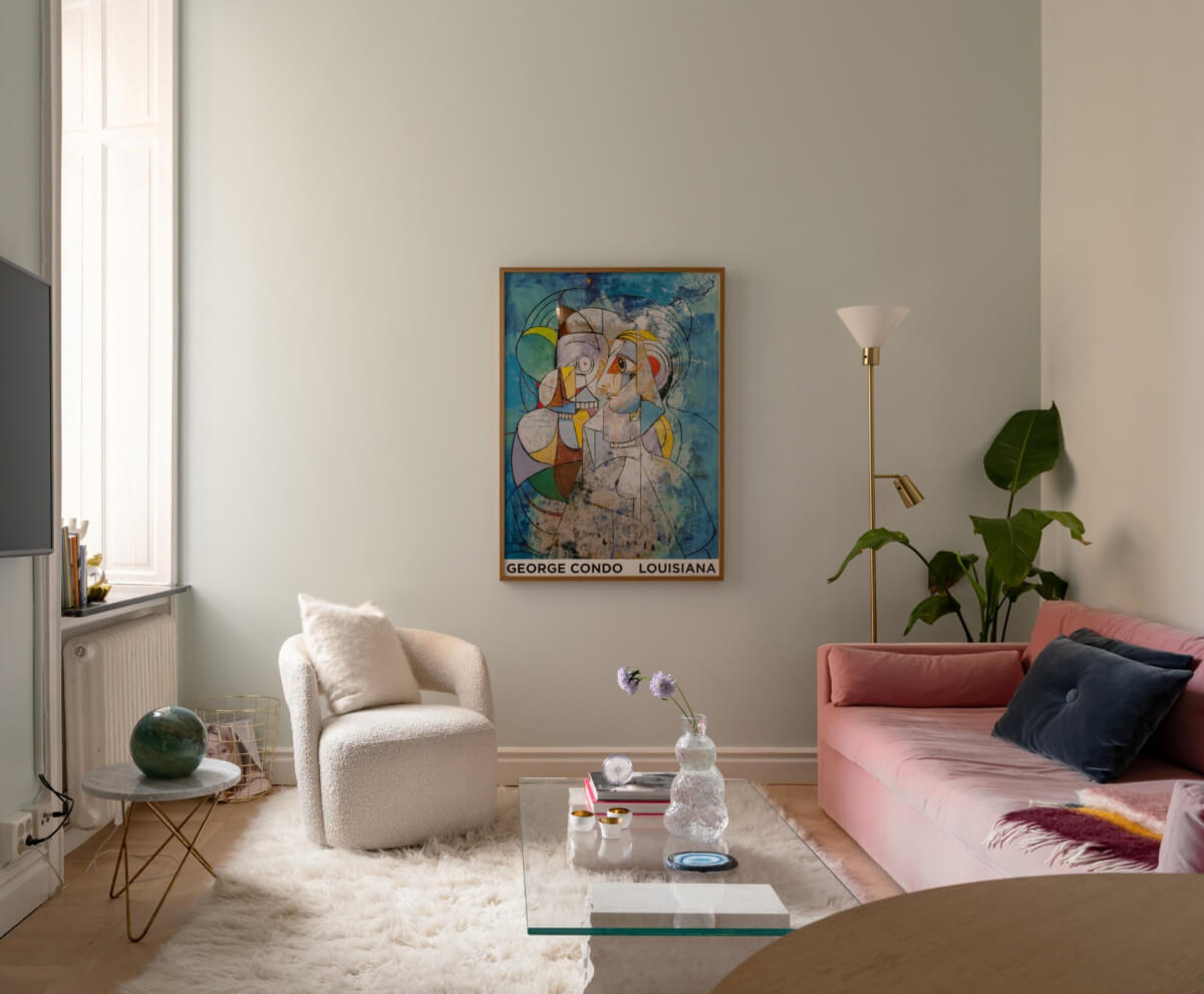 A Small Pink and Blue Apartment with High Ceilings in Stockholm 2 small living room fluffy rug pink sofa