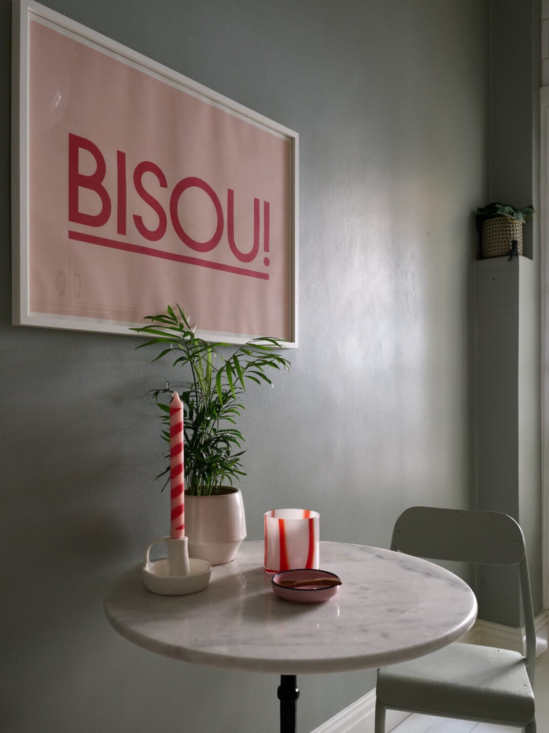 A Charming Small Apartment with a Fresh White Kitchen 11 small marble kitchen table