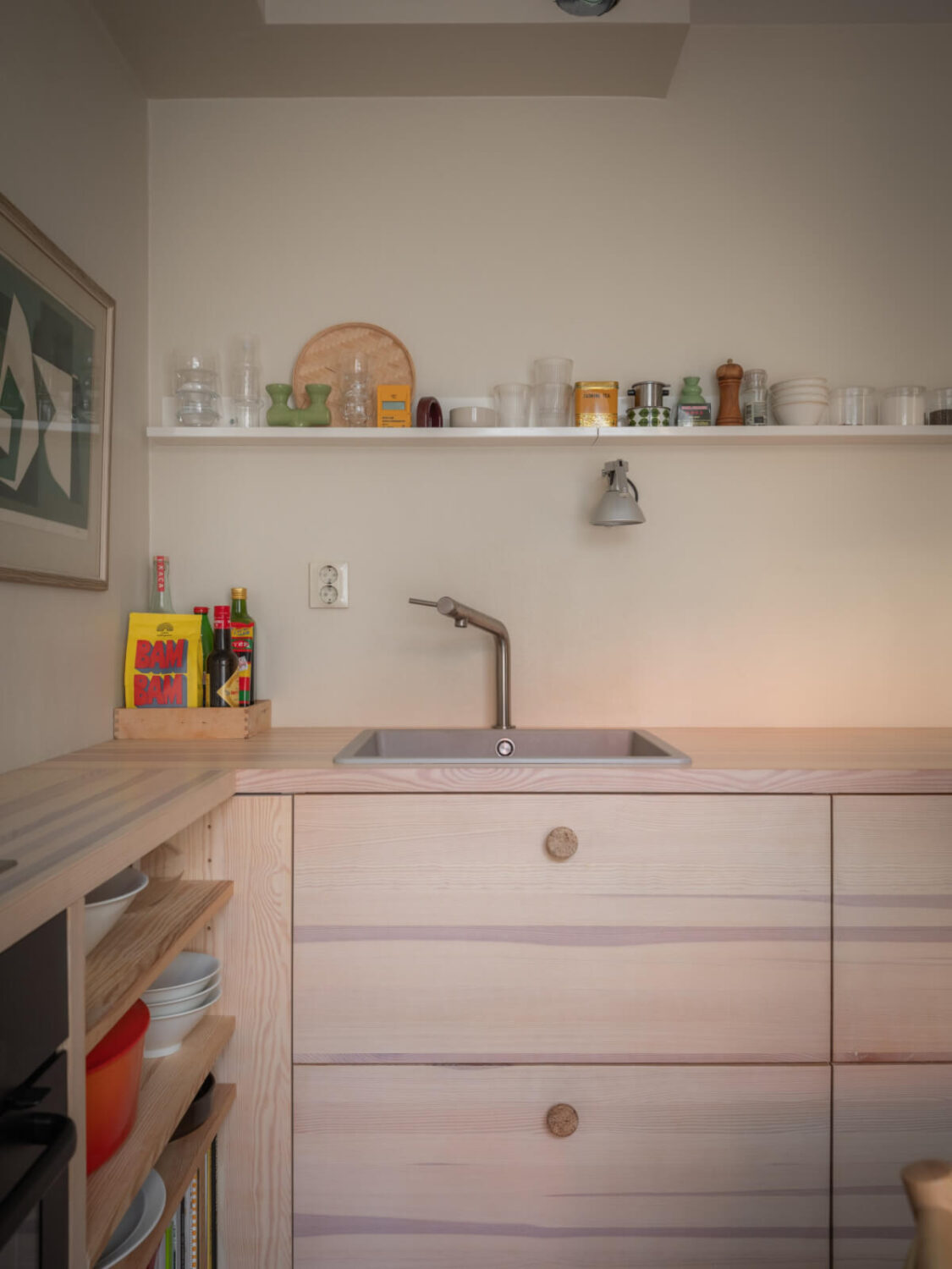 A Design Apartment in an Early 20th Century Building 14 small shelf above kitchen cabinets