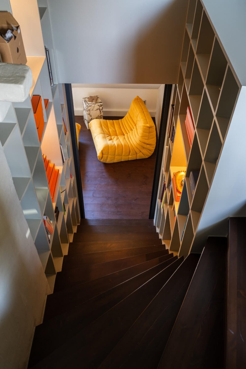 A Light Penthouse Apartment with Built-In Bookshelves 26 staircase custom bookshelves