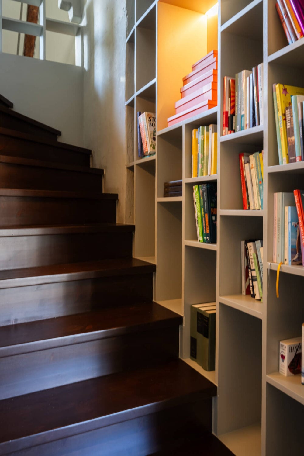 A Light Penthouse Apartment with Built-In Bookshelves 25 staircase with bookshelves