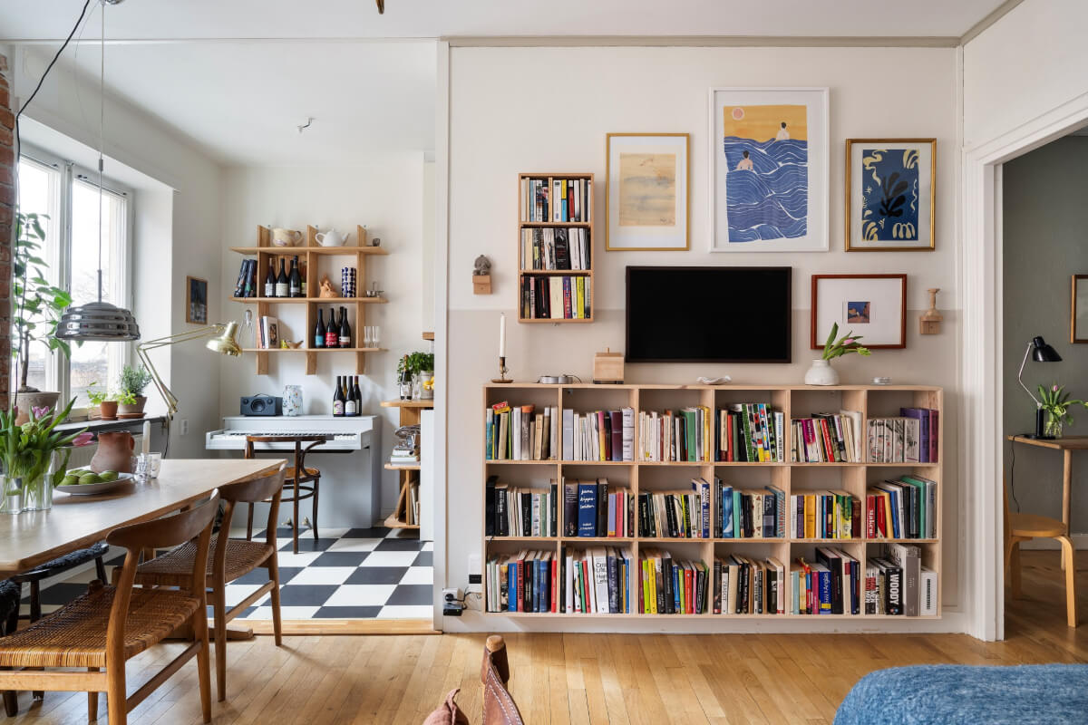 A Studio Apartment with Exposed Brick and Original Details 9 studio apartment bookcases