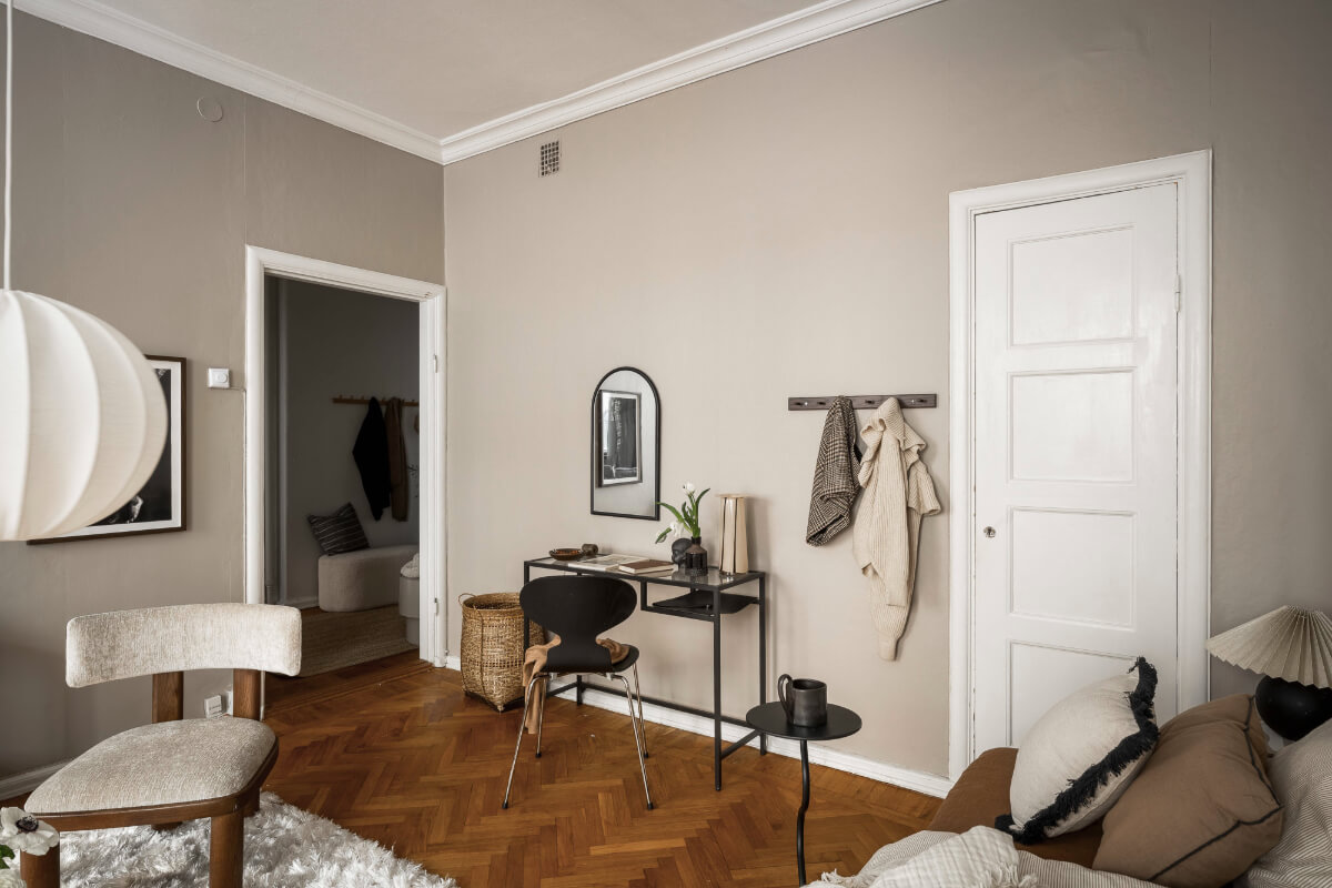 A Light Swedish Studio in an Early 20th Century Building 10 studio apartment herringbone floor desk