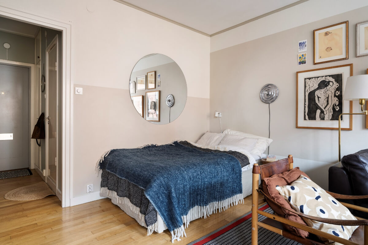 A Studio Apartment with Exposed Brick and Original Details 8 studio apartment large round mirror