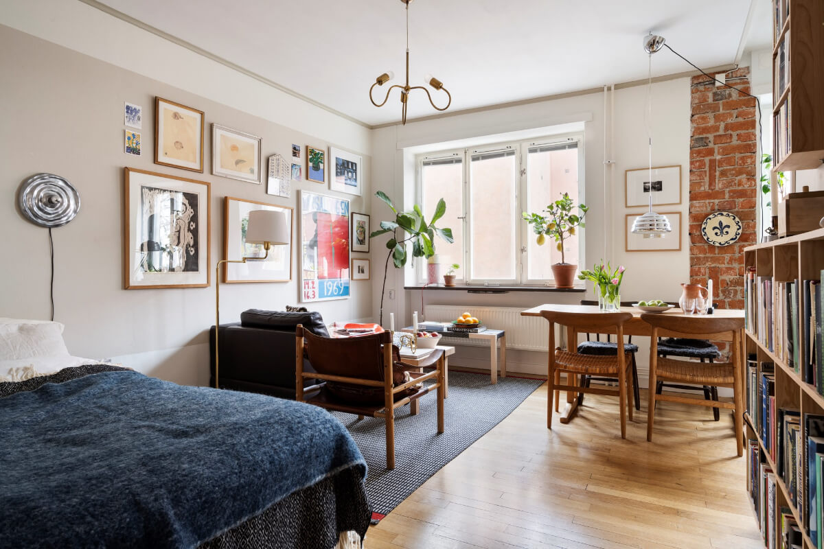 A Studio Apartment with Exposed Brick and Original Details 7 studio apartment two tone wall wooden floor