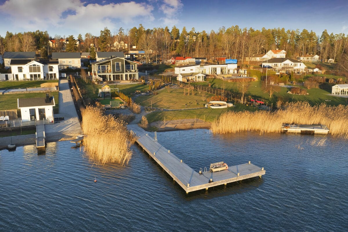 English Manor Style Interiors in a New Swedish Home with Lake Views 32 swedish home by the sea