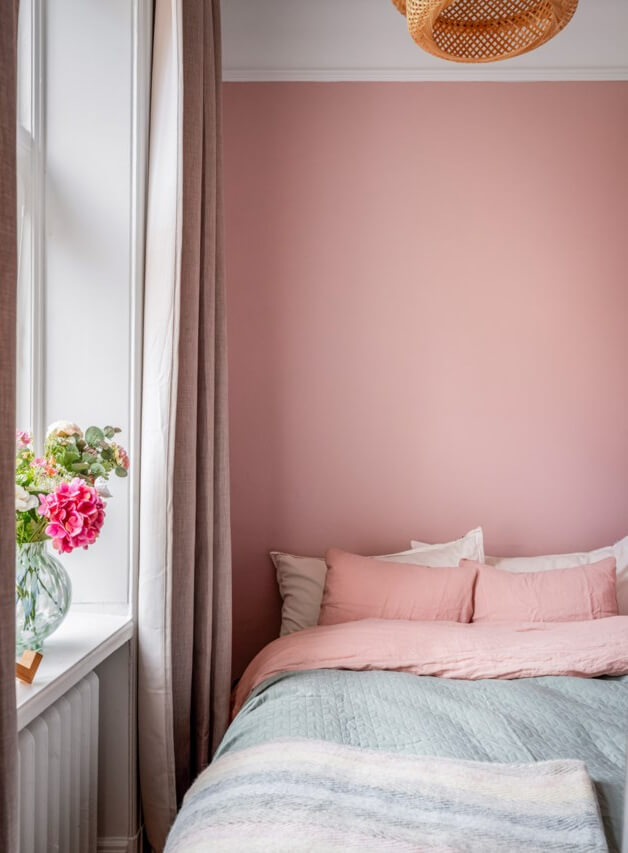 A Small Light-Filled Apartment with a Pink Bedroom 18 tiny bedroom pink walls