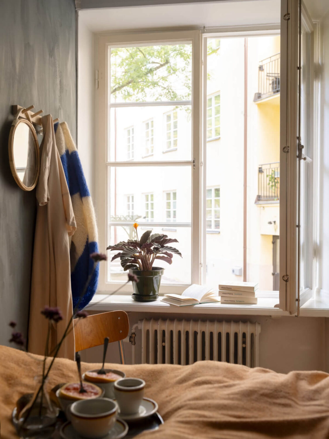 A Charming One-Bedroom Apartment in a 1920s Building 22 tiny bedroom window