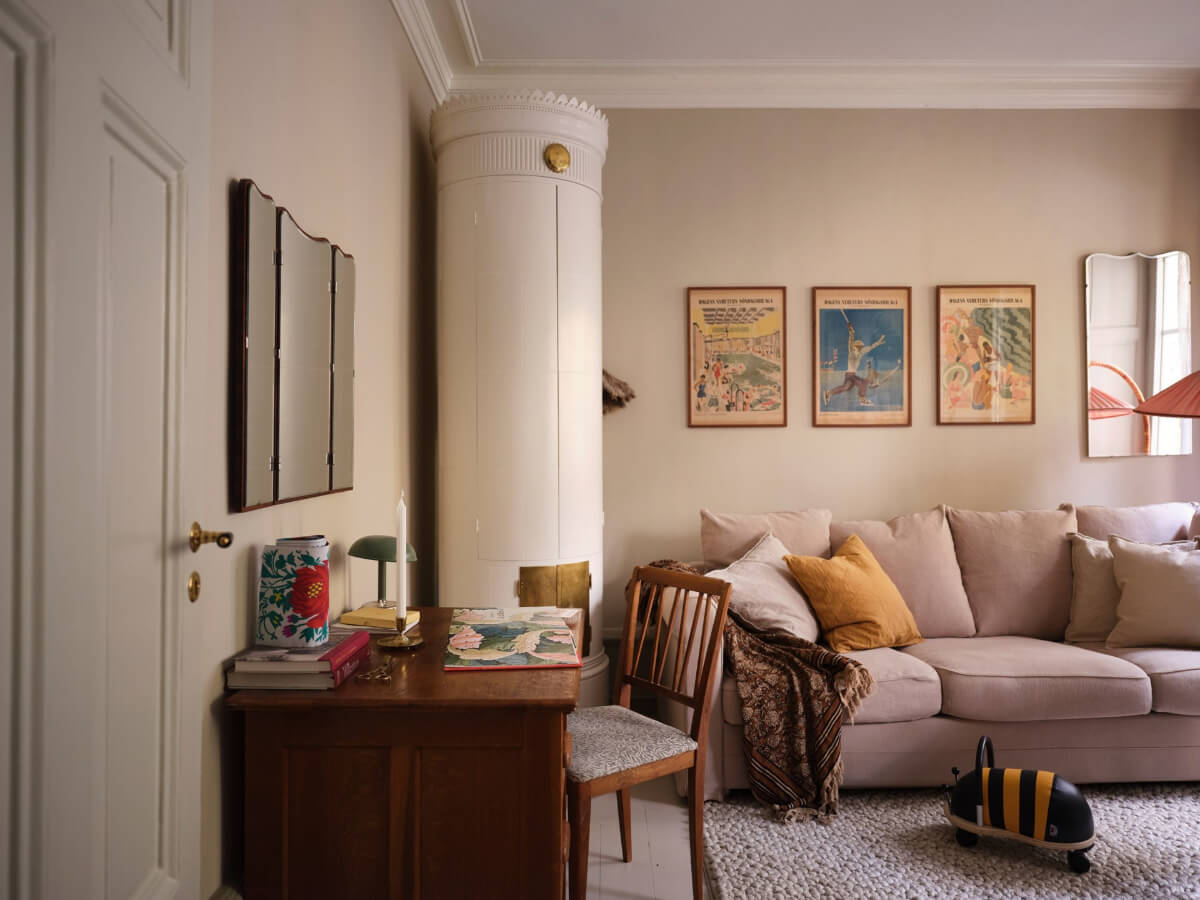 A Charming Vintage Apartment with Historic Wallpapers in Stockholm 4 tiny living room with antique desk