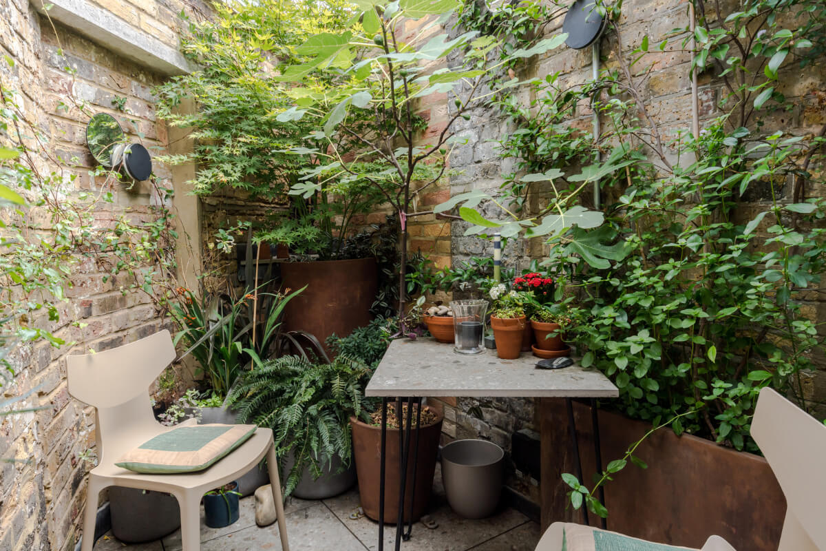 A Narrow Five-Story House with a Roof Garden in London's Clerkenwell 20 tiny walled garden