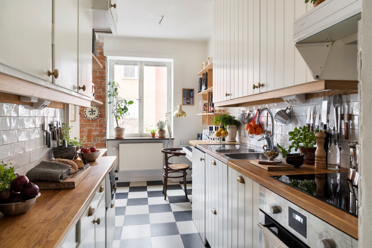 A Studio Apartment with Exposed Brick and Original Details 11 traditional kitchen checkerboard floor