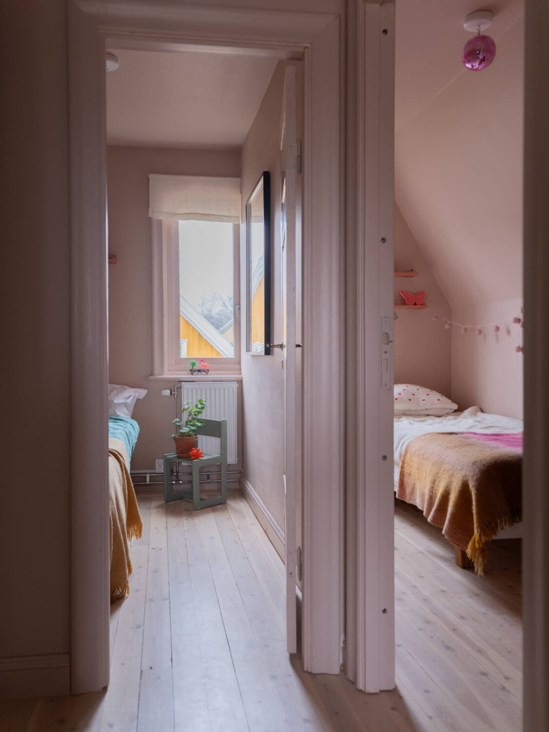 A 1920s Villa Pairs Modern Design and Period Features 26 two pink bedrooms slanted ceilings