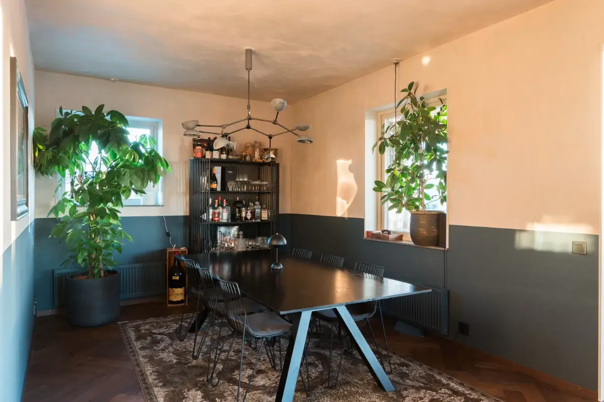 A Top Floor Swedish Apartment with a Huge Balcony 10 two tone walls dining area