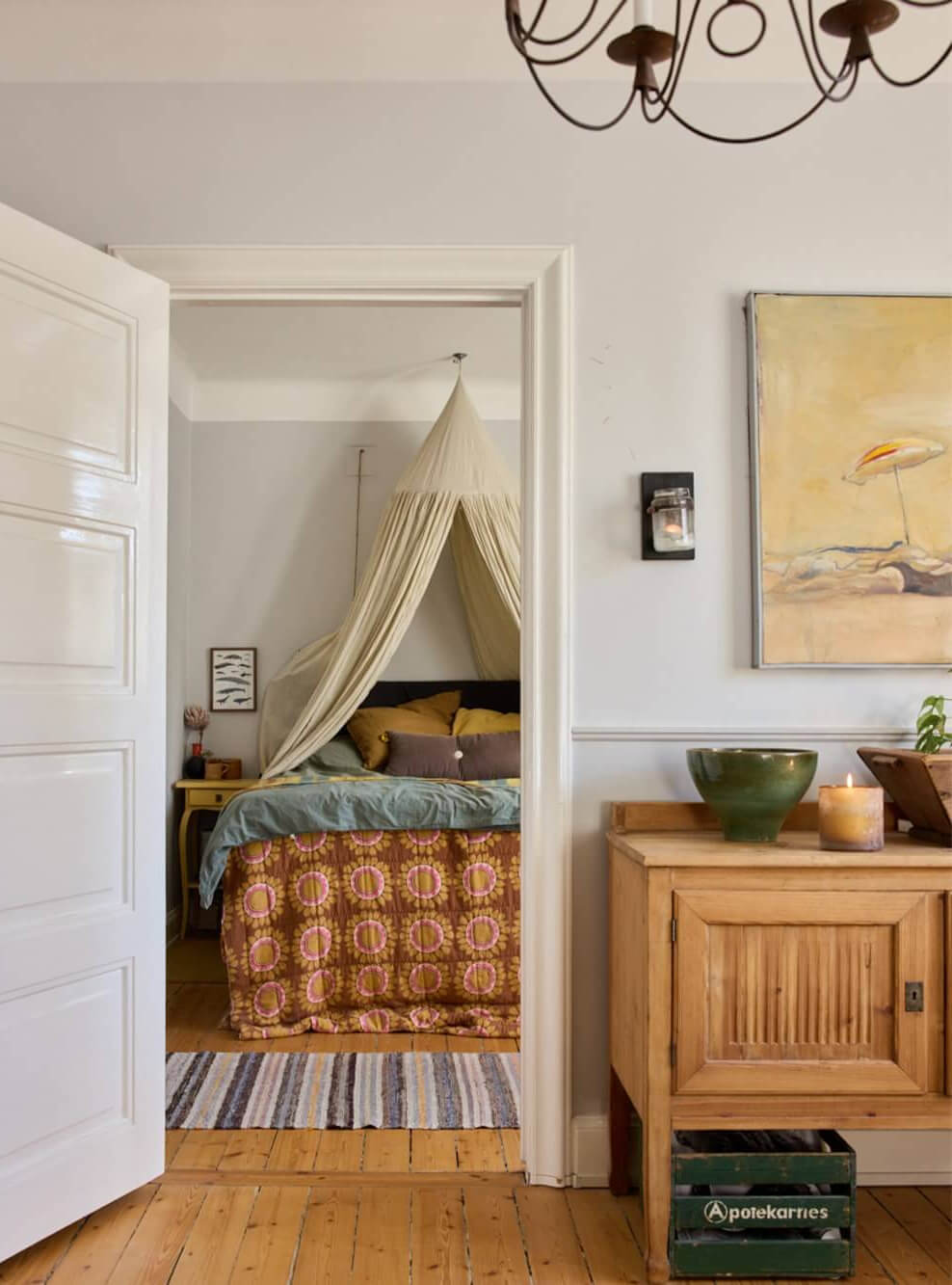 A Charming Apartment with Period Details in Malmö 6 view into bedroom