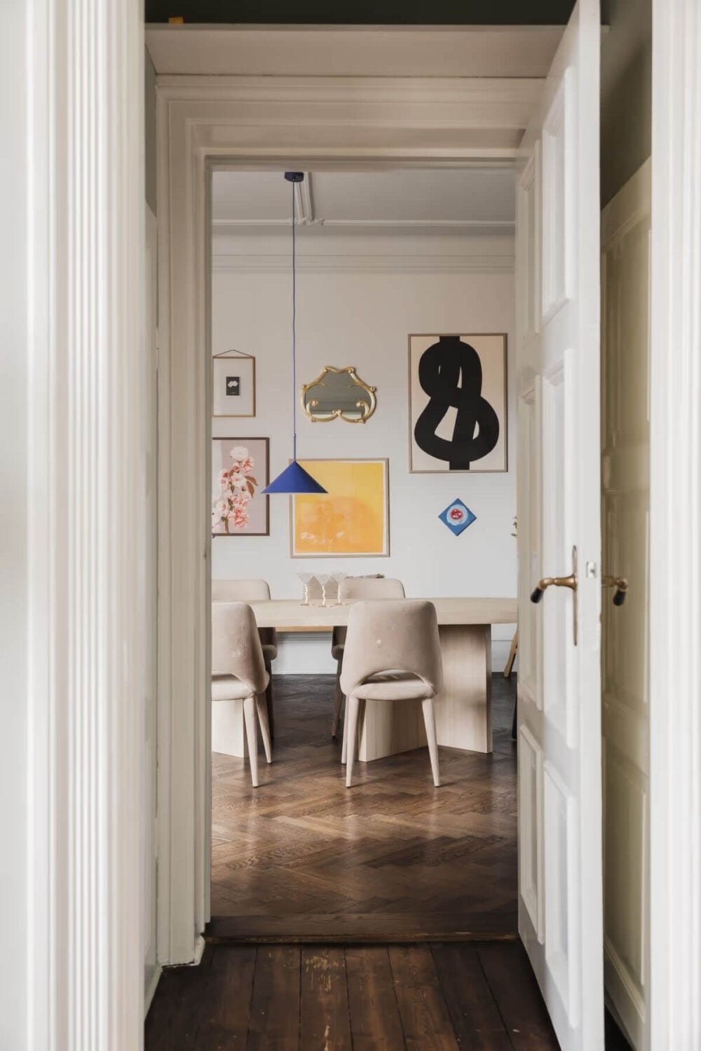 Grand Rooms and Period Features in a Malmö Apartment 11 view into dining room