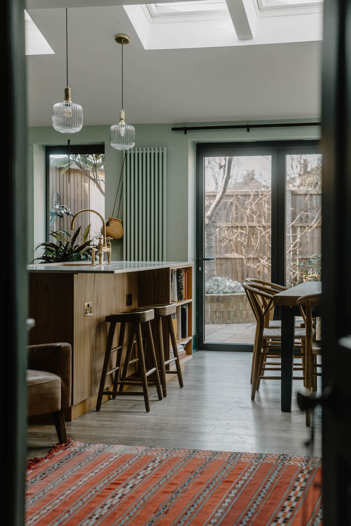 Moroccan-Inspired Designs in a Unique Artist Family Home in London 5 view into extended kitchen