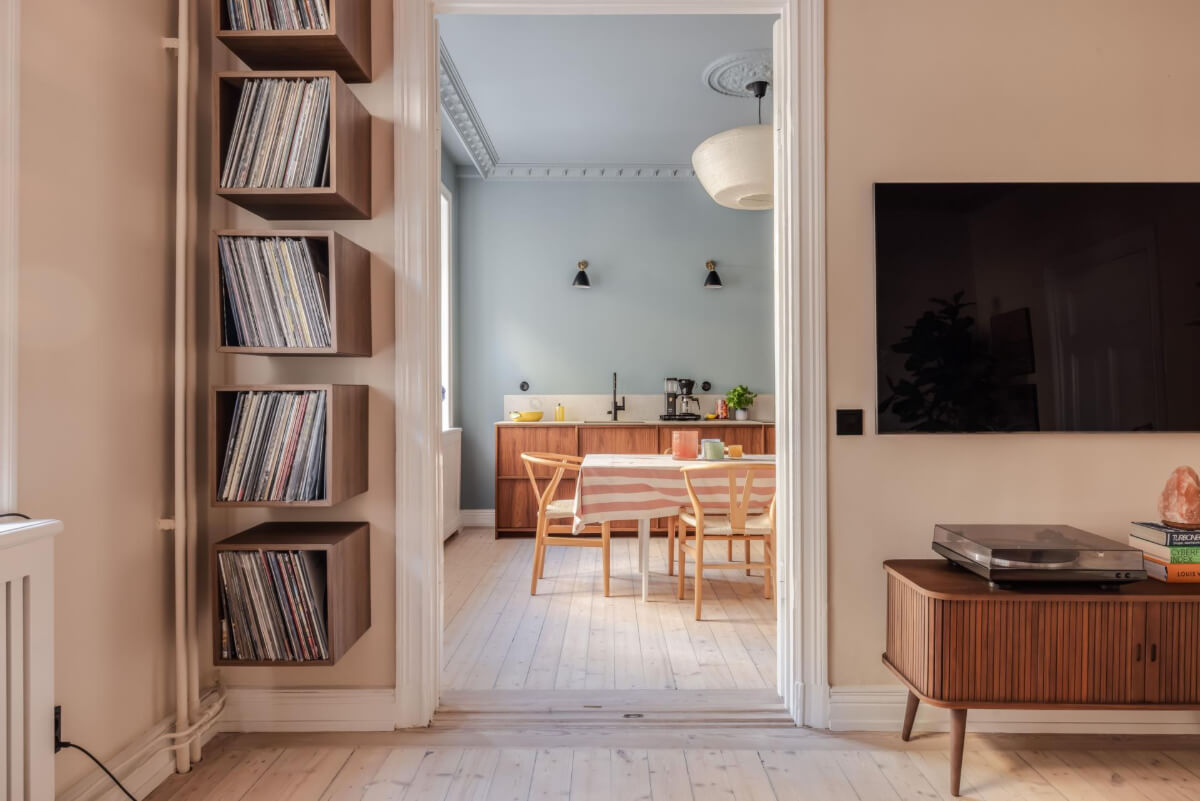 Pastel Colors and Contemporary Design in a Late 19th Century Apartment 7 view into kitchen
