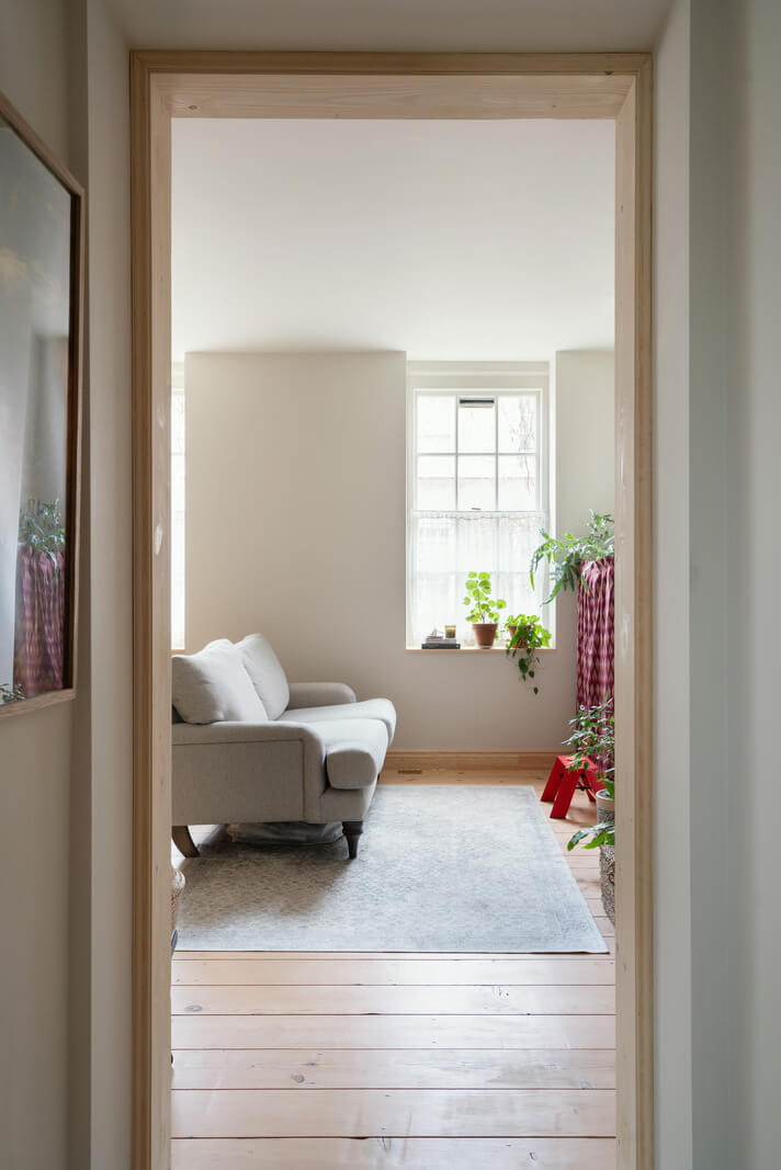 A Tiny Apartment with a Yellow Kitchen in London 8 view into small living room