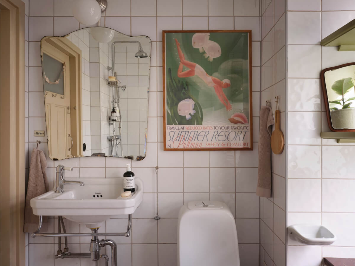 A Charming Vintage Apartment with Historic Wallpapers in Stockholm 18 vintage mirror bathroom