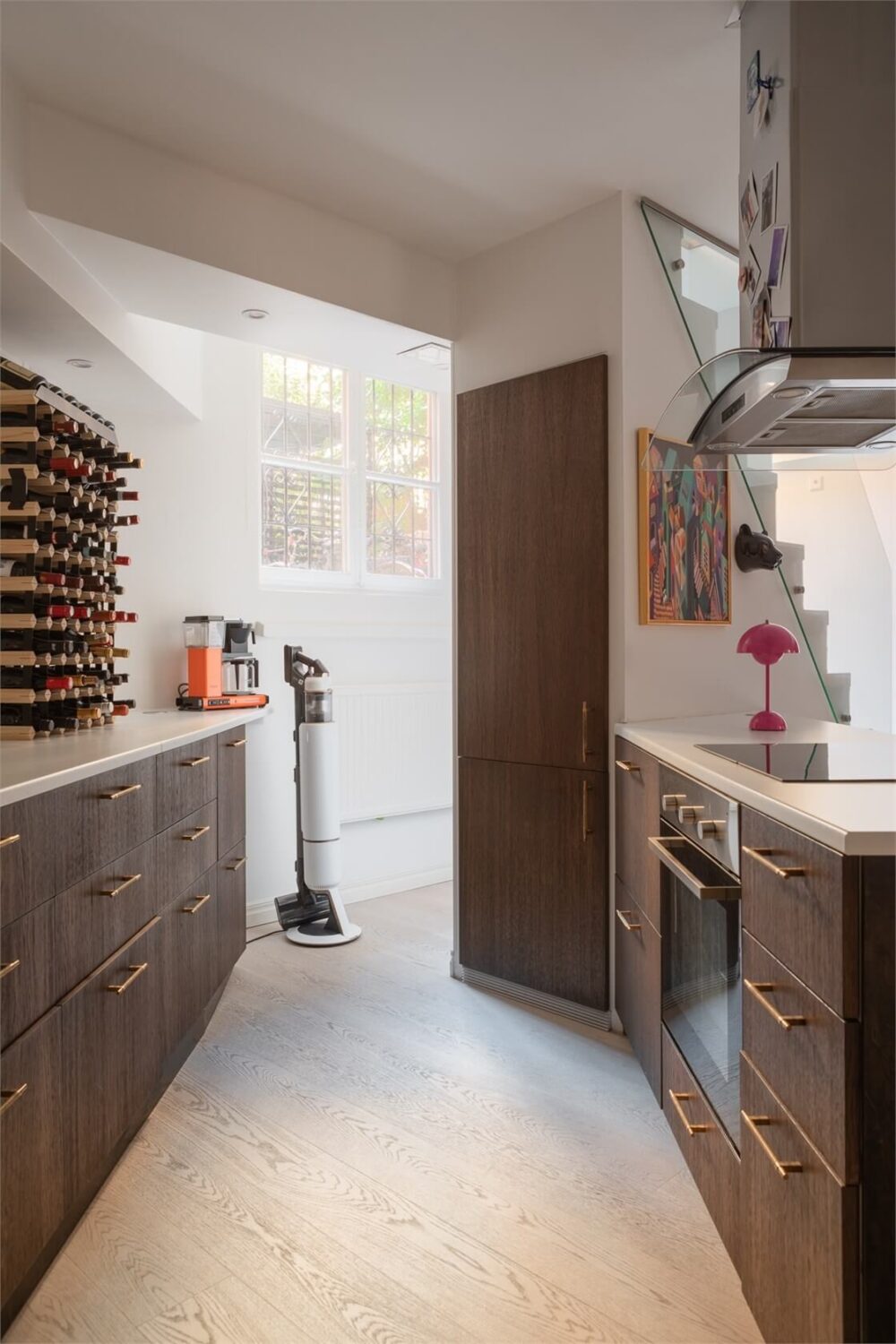 A Colorful Basement Duplex Apartment in Stockholm 12 walnut kitchen