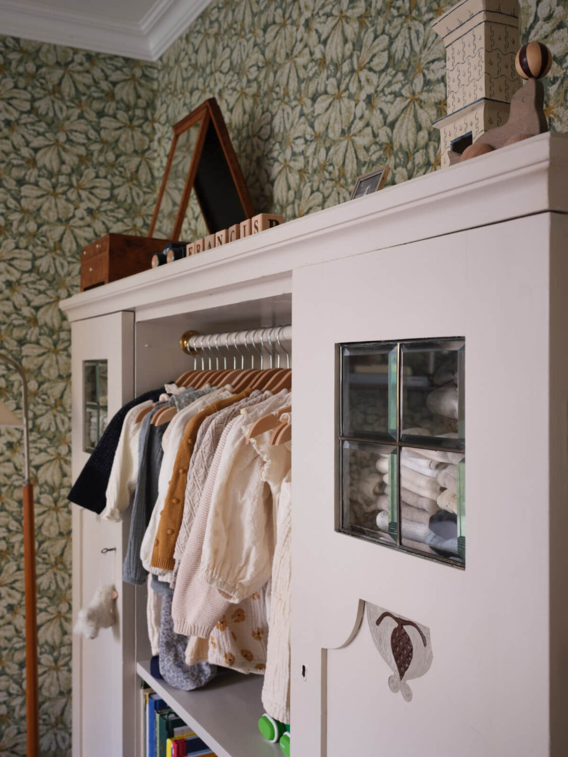 A Charming Vintage Apartment with Historic Wallpapers in Stockholm 15 wardrobe with baby clothes