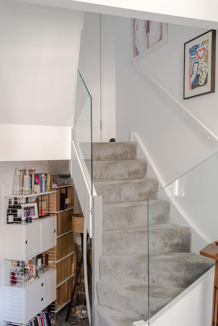 A Narrow Five-Story House with a Roof Garden in London's Clerkenwell 8 white staircase