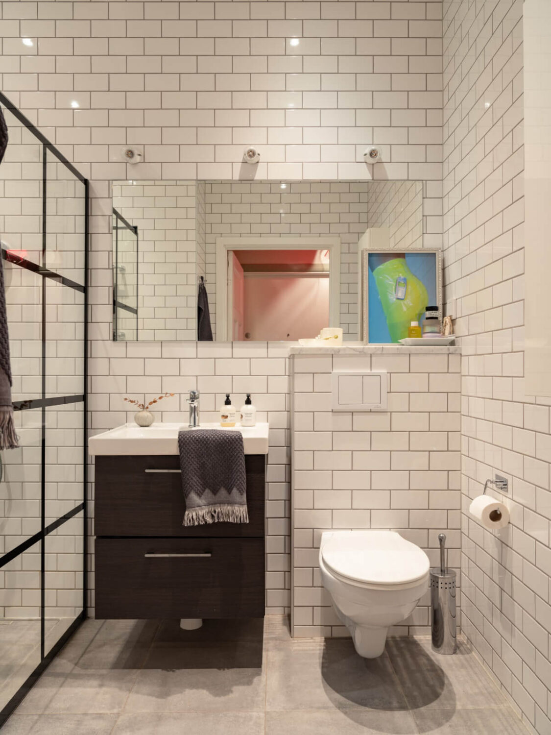 A Pink and Orange Bedroom in a Light Stockholm Apartment 22 white subway tiles bathroom