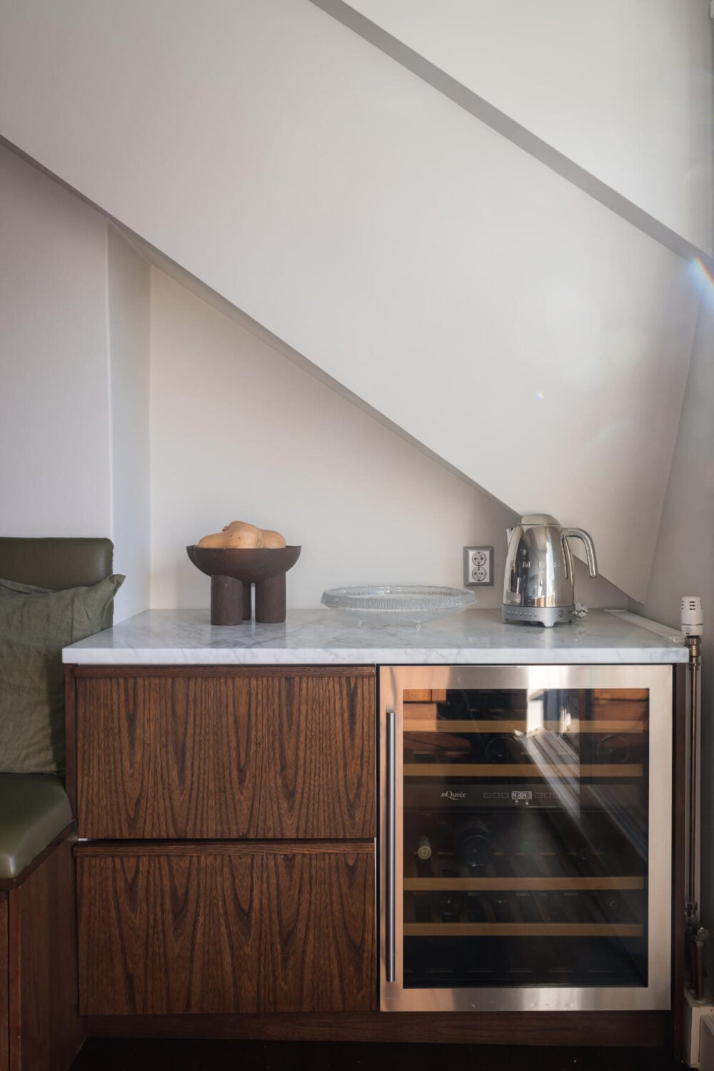 A Light Penthouse Apartment with Built-In Bookshelves 15 wine fridge