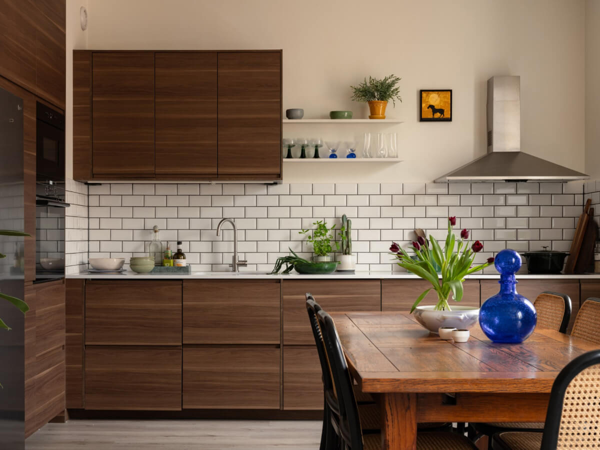 A Pink and Orange Bedroom in a Light Stockholm Apartment 11 wooden kitchen classic subway tiles