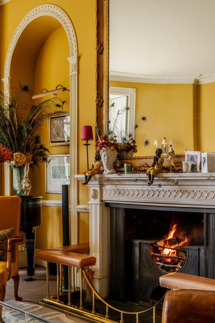 Period Features and Color in a Pretty Georgian House 3 yellow living room fireplace