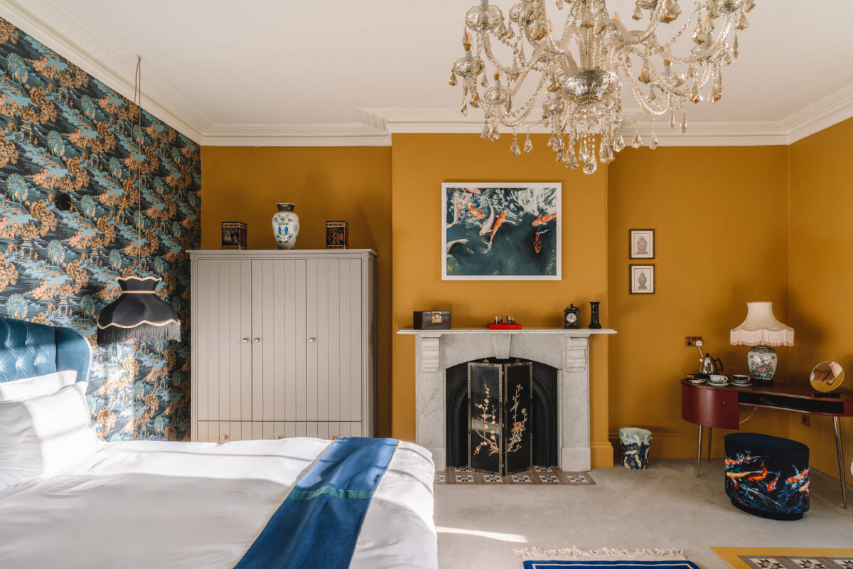 Colorful Rooms in a Regency Manor House in Yorkshire 15 yellow walls bedroom marble fireplace wallpaper