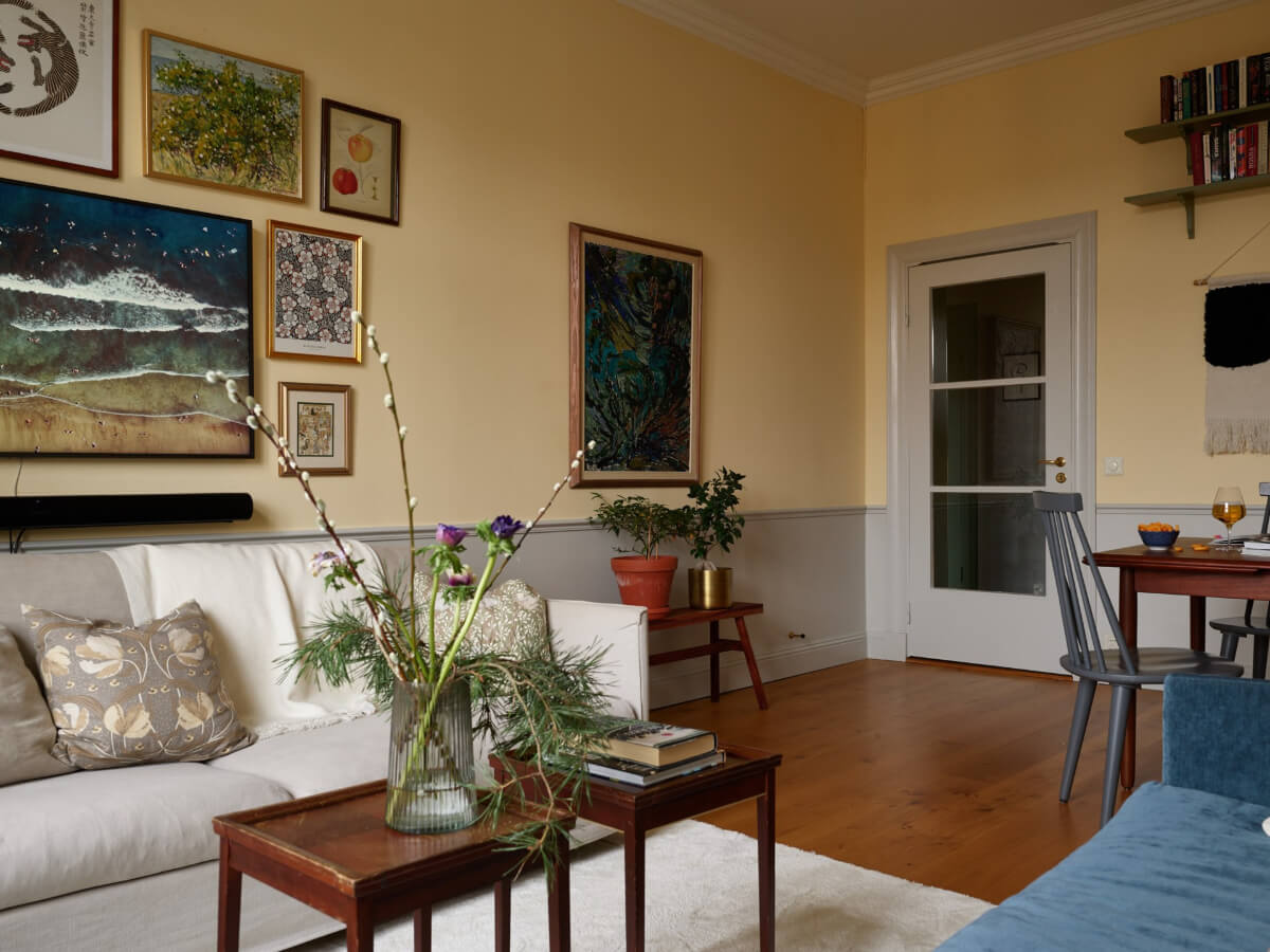Lovely Color Combinations in a Charming One-Bedroom Apartment 6 yellow walls gray joinery