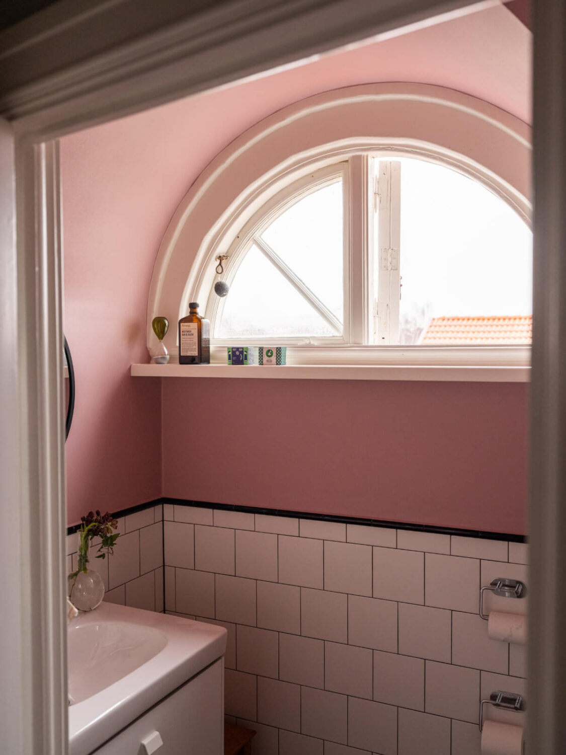 A Beautiful Renovated Family Home with a Charming Garden 34 arched bathroom window