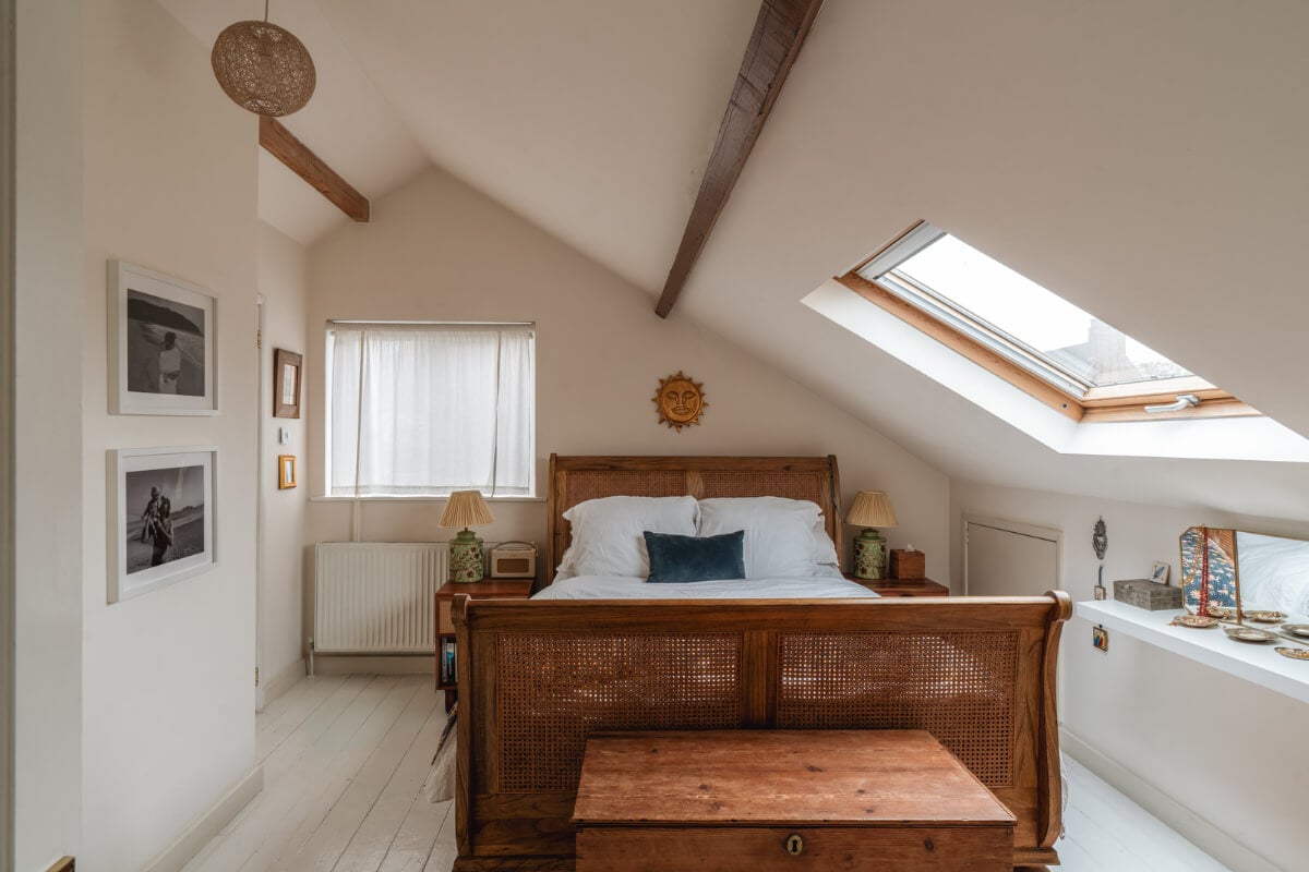 A Cozy Two-Bedroom Attic Apartment in a Victorian Townhouse 16 attic bedroom exposed beams