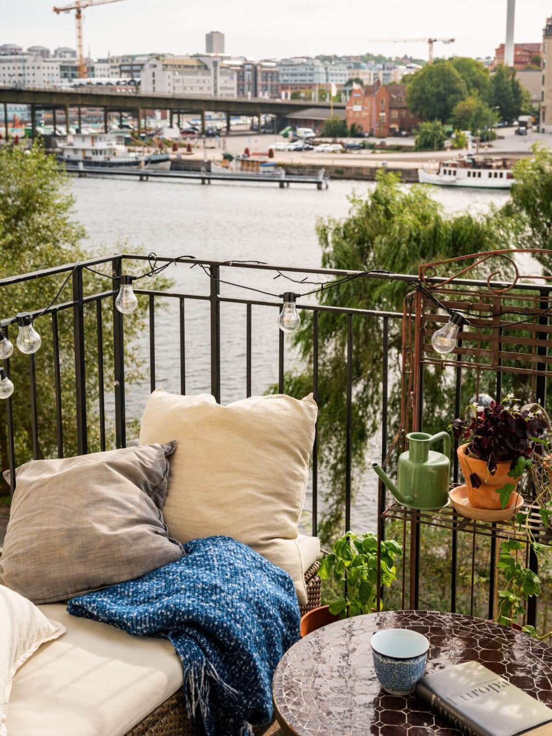 Gray Tones and Built-in Storage in a Charming Corner Apartment 6 balcony view