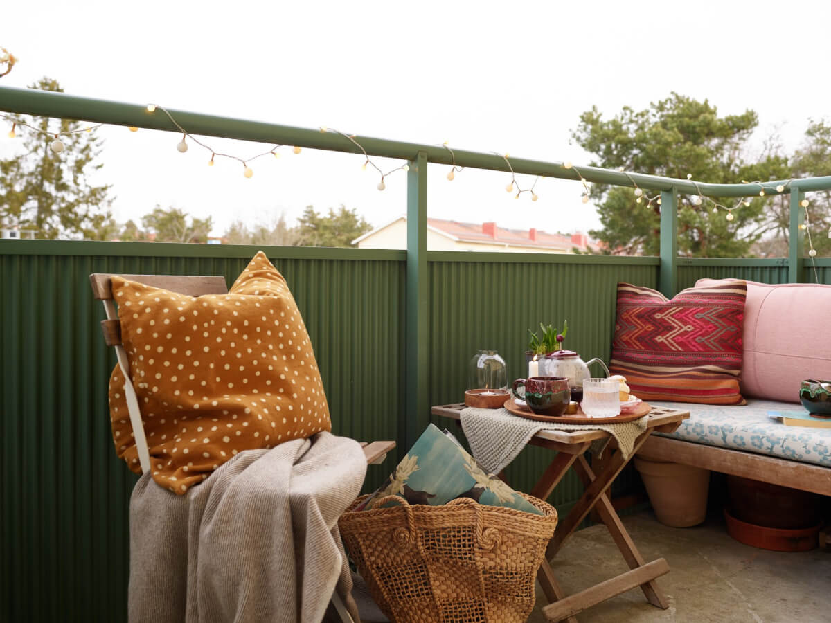 A Renovated 1940s Apartment with Colorful Bedrooms 8 balcony with bench