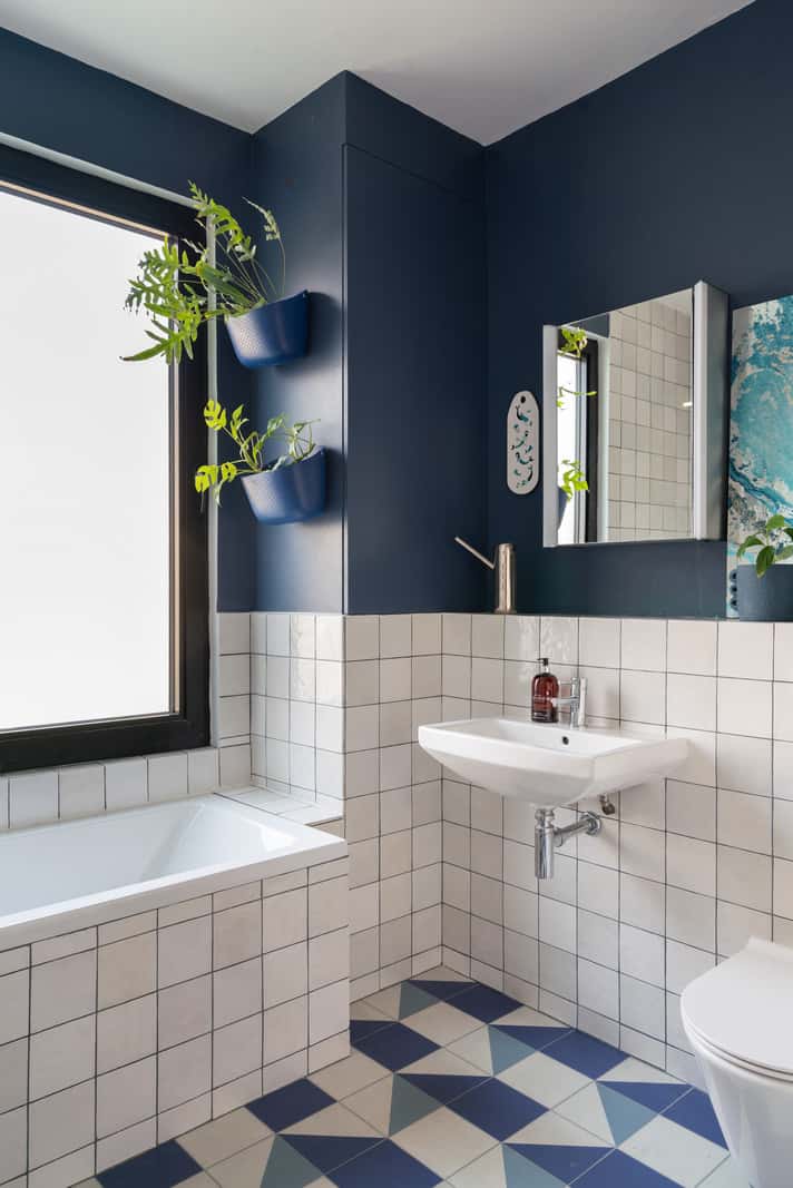 A Colorful Home with a Gold Extension in North London 23 bathroom blue walls and tiles