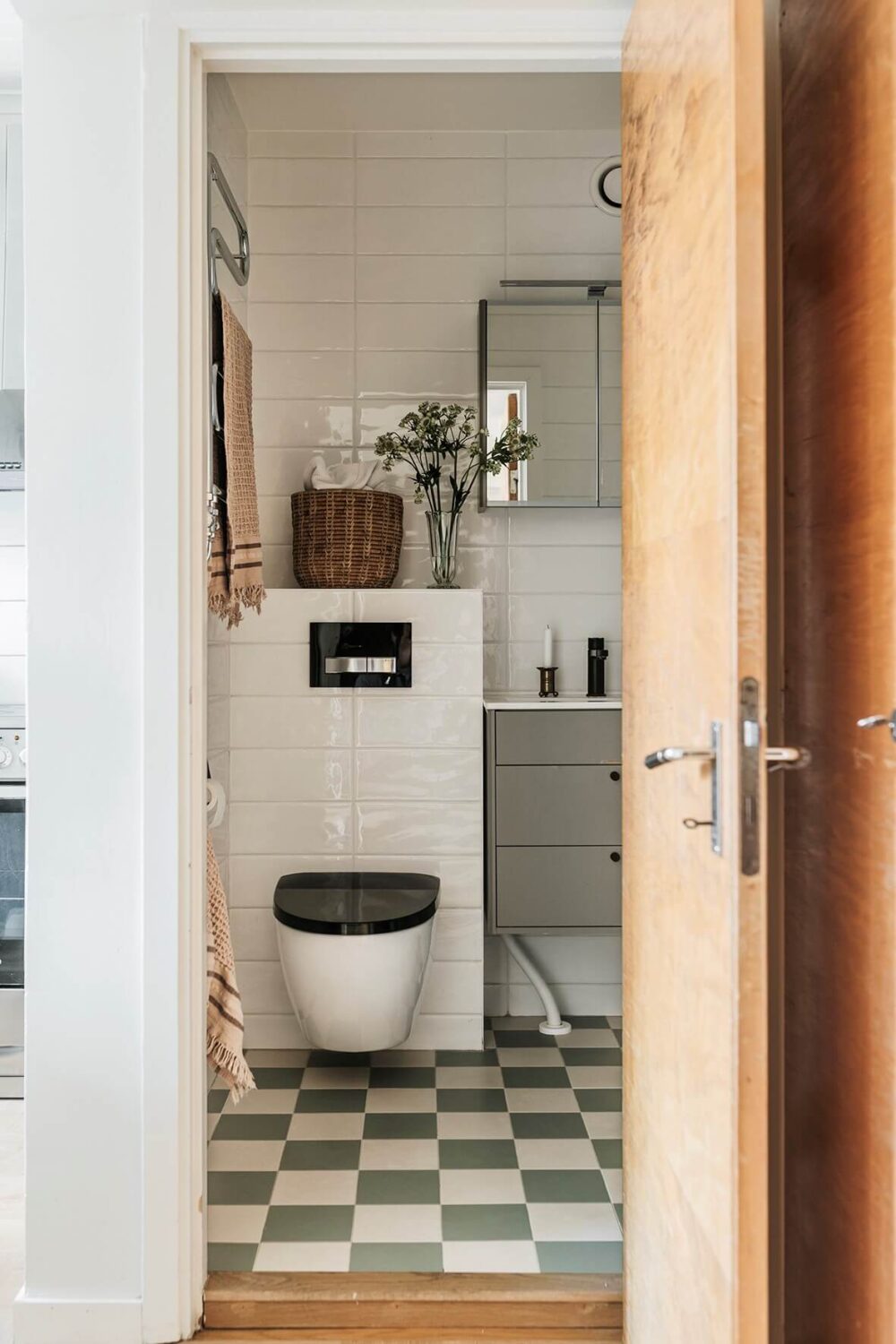 A Two-Bedroom Apartment with the Original Midcentury Kitchen 19 bathroom green checkerboard floor