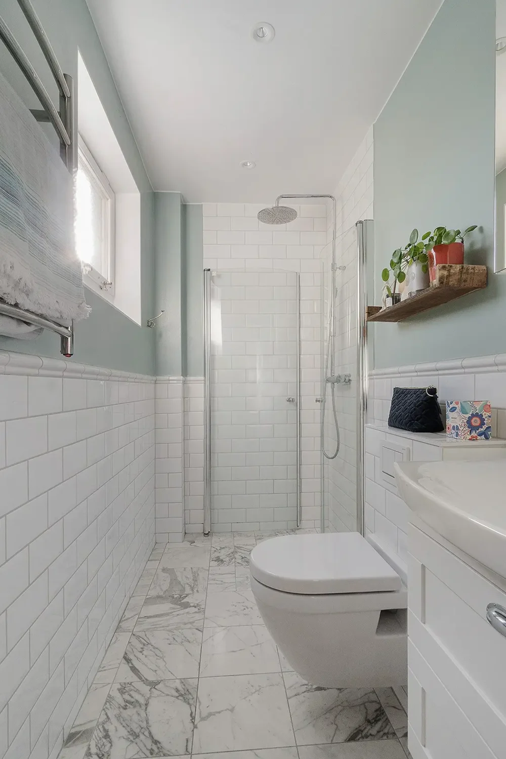 A Charming Early 20th-Century Family Home in Sweden 16 bathroom marble tiles