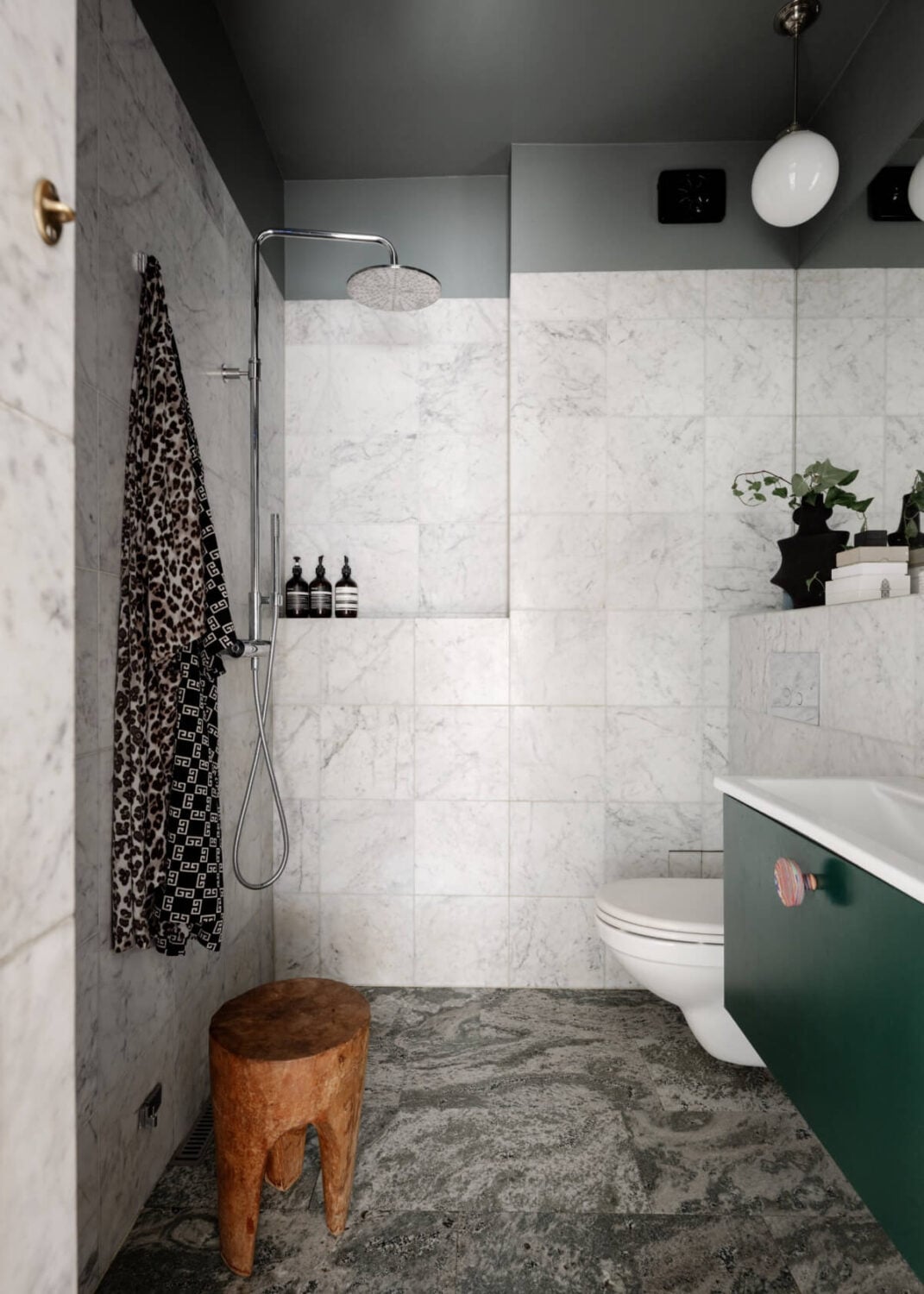 An Amazing Swedish House with Pink and Gray Rooms 28 bathroom marble tiles green bathroom vanity