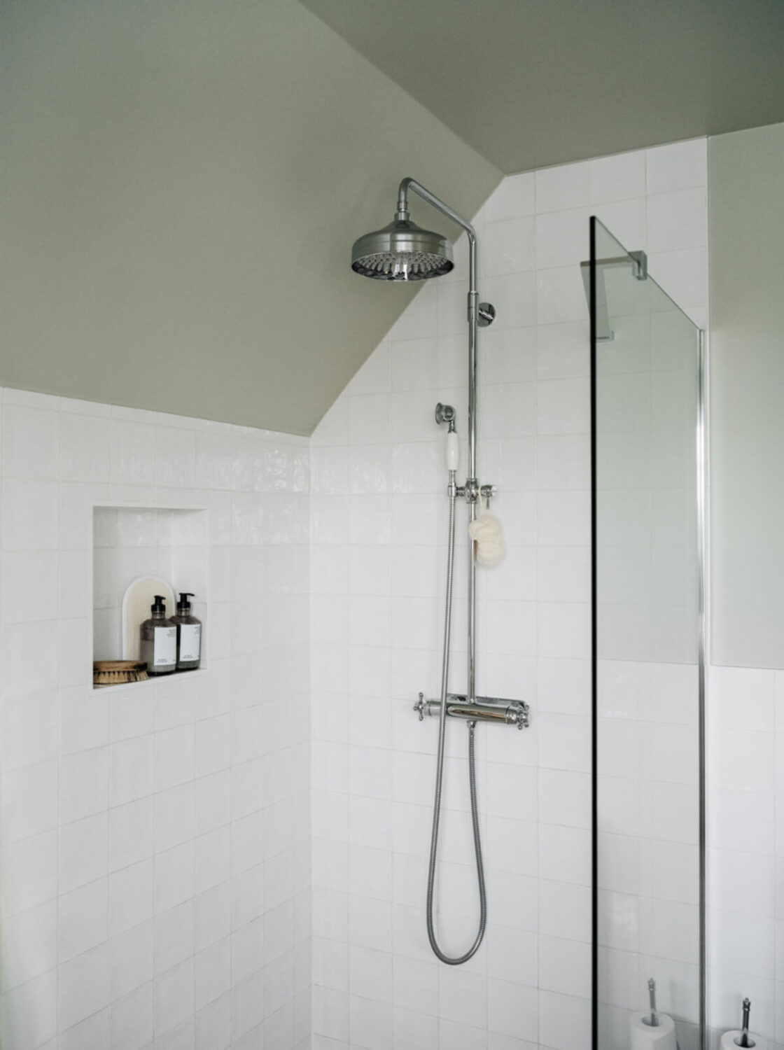 Light-Filled Rooms in a Charming 1907 Swedish Villa 32 bathroom shower slanted ceiling