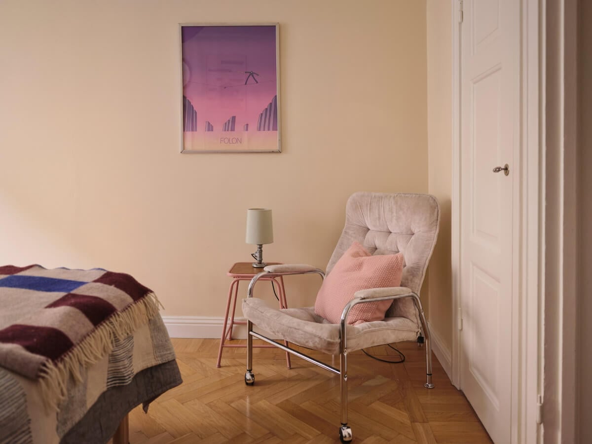 A Corner Apartment with Period Features and Bright Color Pops 13 bedroom chair herringbone parquet floor