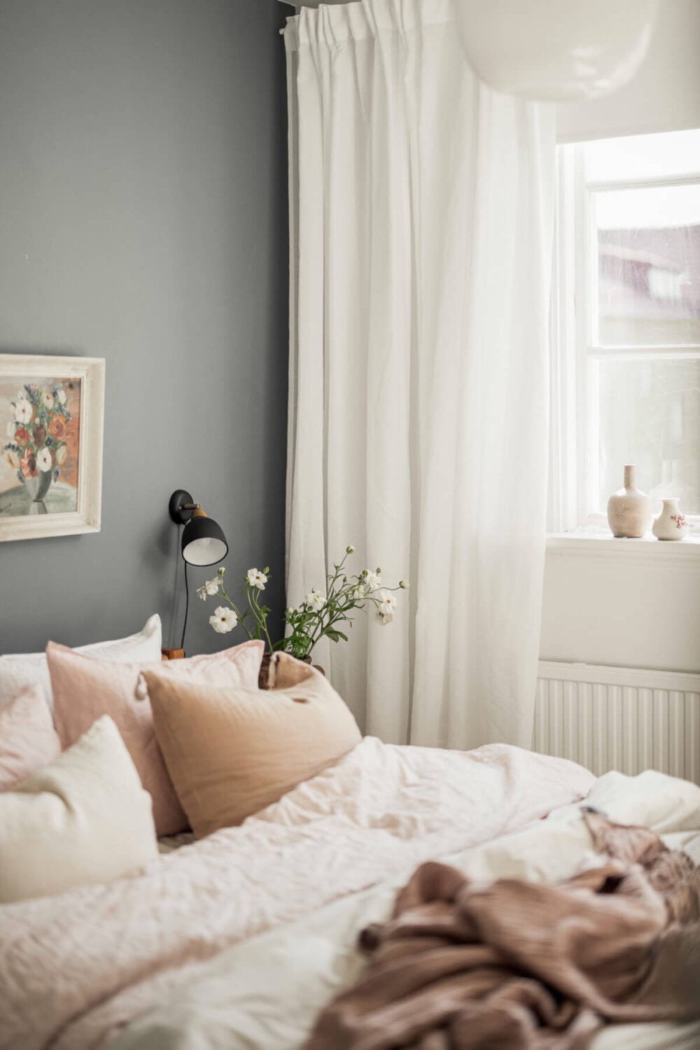 A Swedish Duplex Apartment Inspired by A Danish Summer House 29 bedroom detail blue accent wall